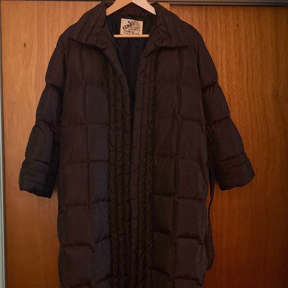 Insulated used jacket with belt and two side pockets size 9 good condition